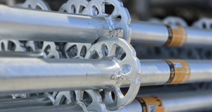 Close-up of MonZon scaffolding standards with rosette connection points