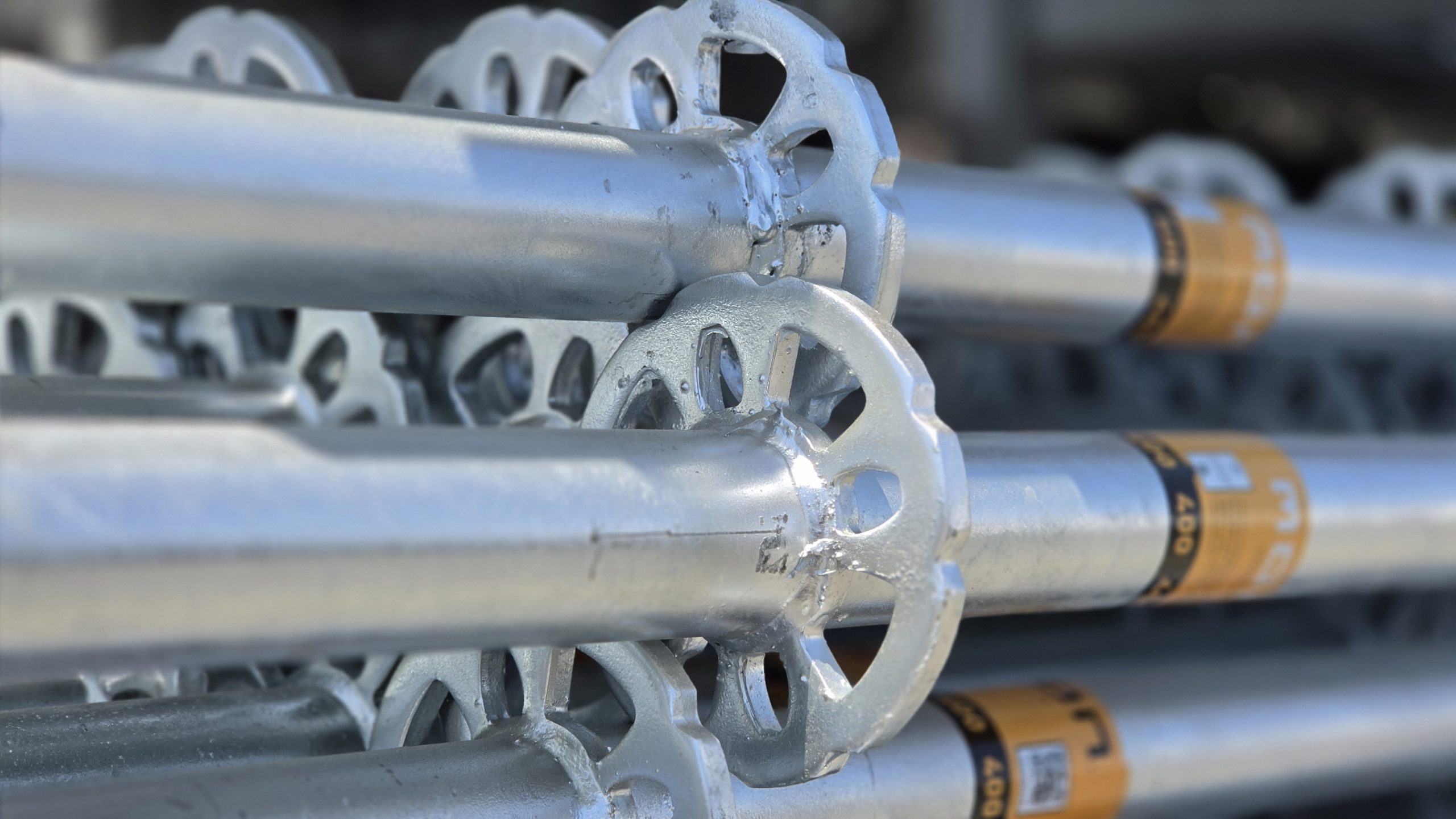 Close-up of MonZon scaffolding standards with rosette connection points