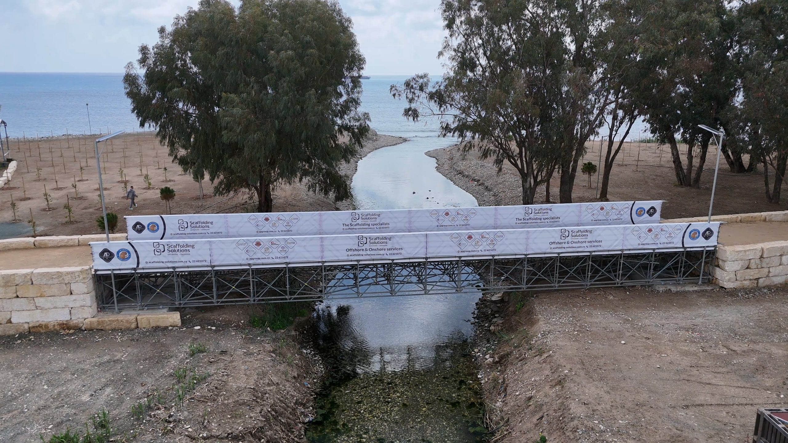 Scaffolding bridge spanning the Garyllis River, viewed towards the sea